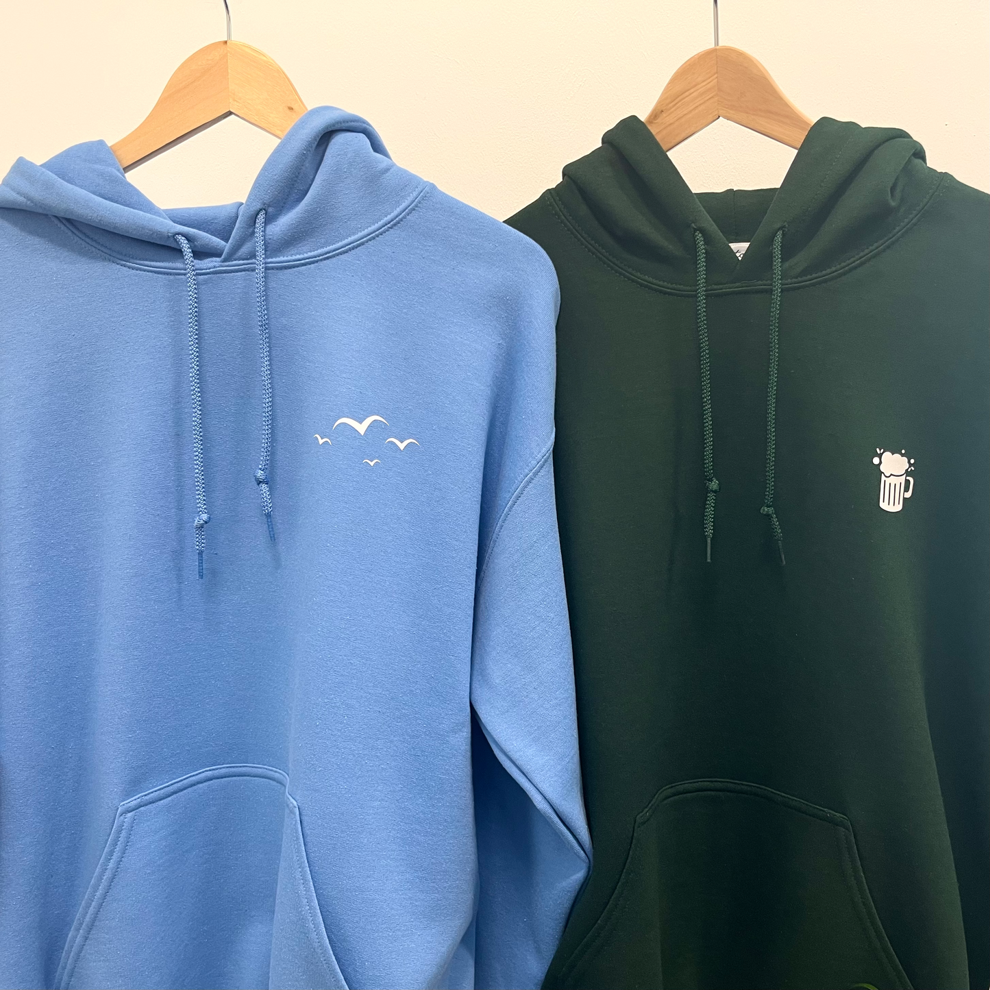 BIG WALK THEN PUB HOODIE. Dark green with white print.