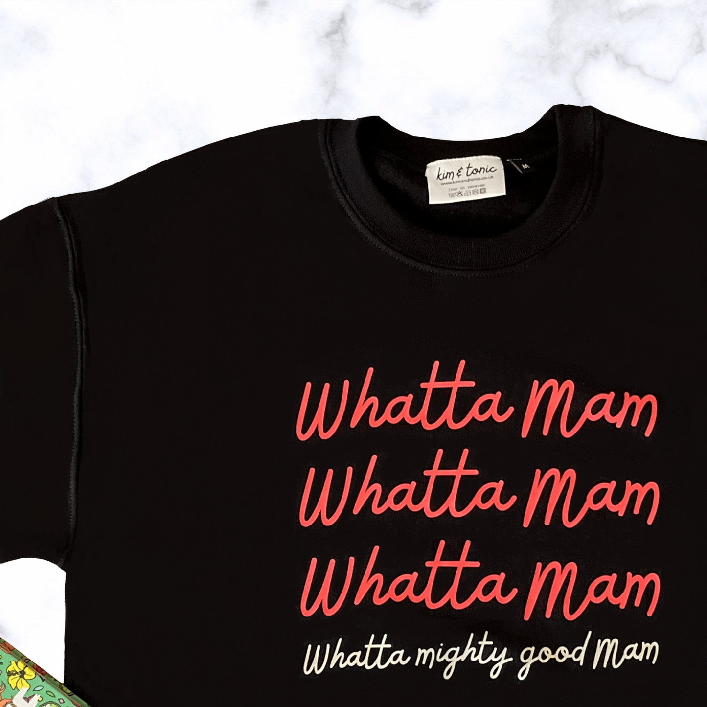 WHATTA MAM SWEATSHIRT. Black with coral and cream print.