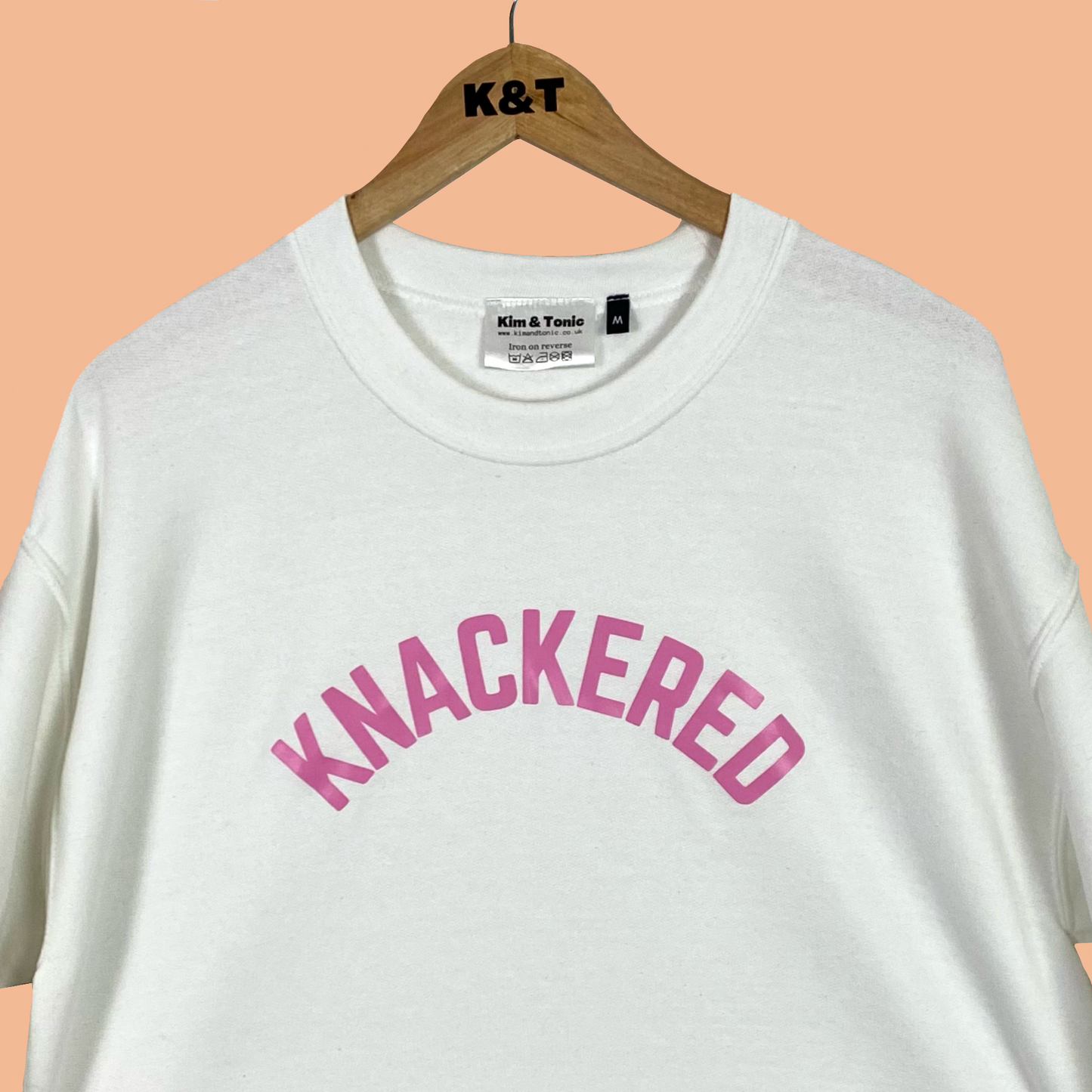 KNACKERED SWEATSHIRT. White with pink print.