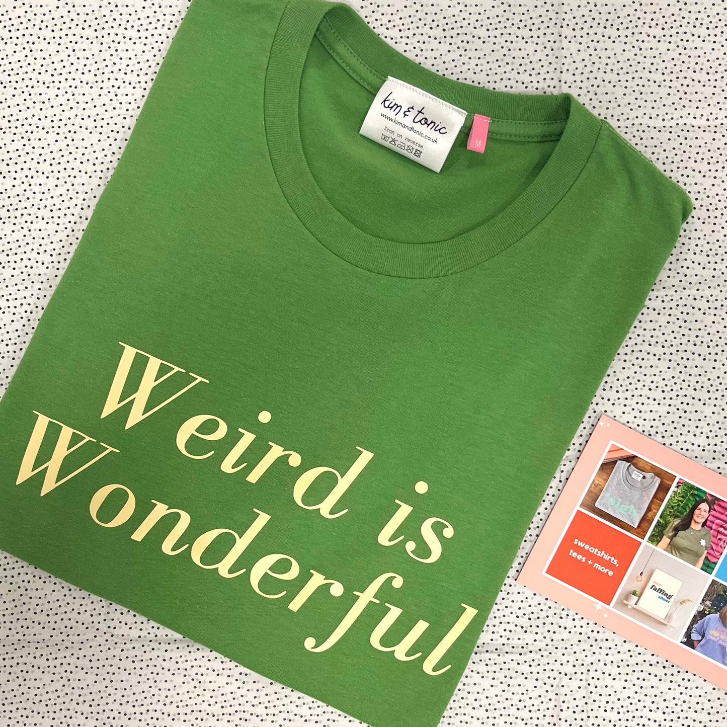 WEIRD IS WONDERFUL T-SHIRT. Green with cream print.