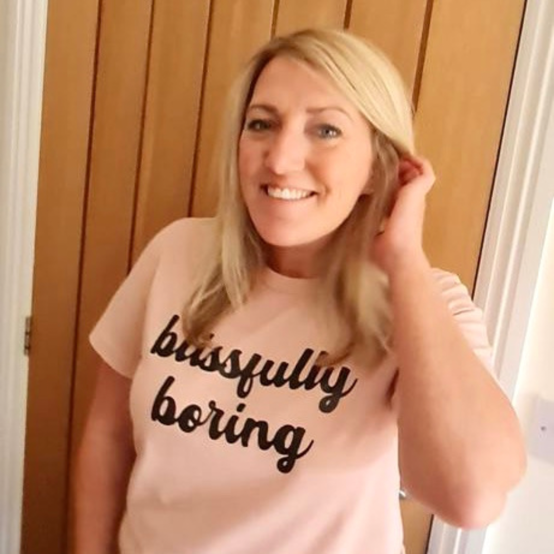 BLISSFULLY BORING T-SHIRT. Peach with black print.