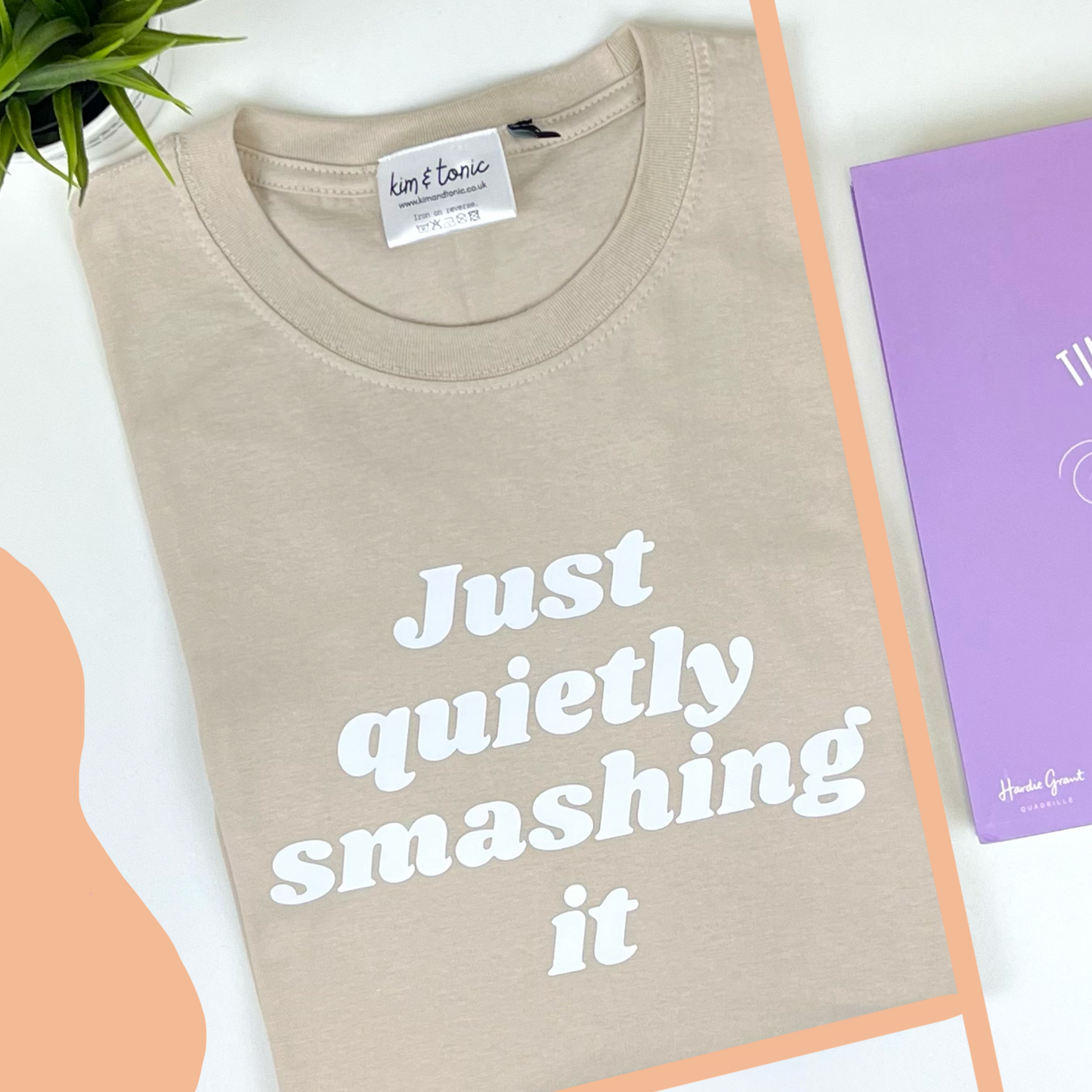 JUST QUIETLY SMASHING IT T-shirt. Sand with white print.