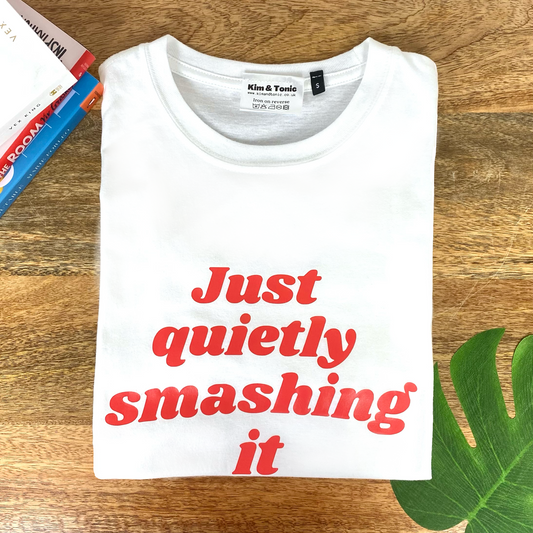 JUST QUIETLY SMASHING IT T-shirt. White with coral red print.