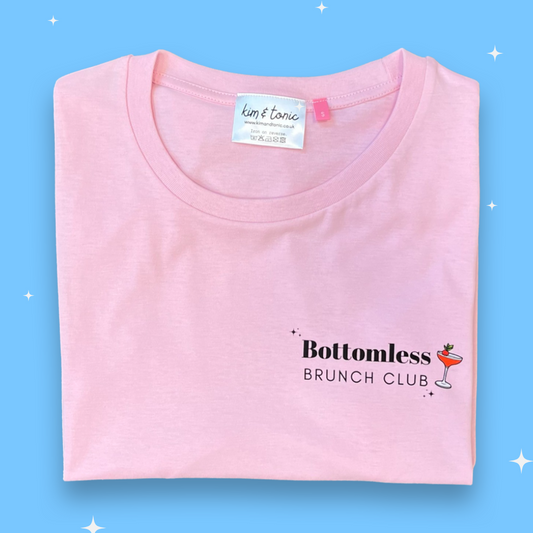 BOTTOMLESS BRUNCH CLUB. Pink with black print.