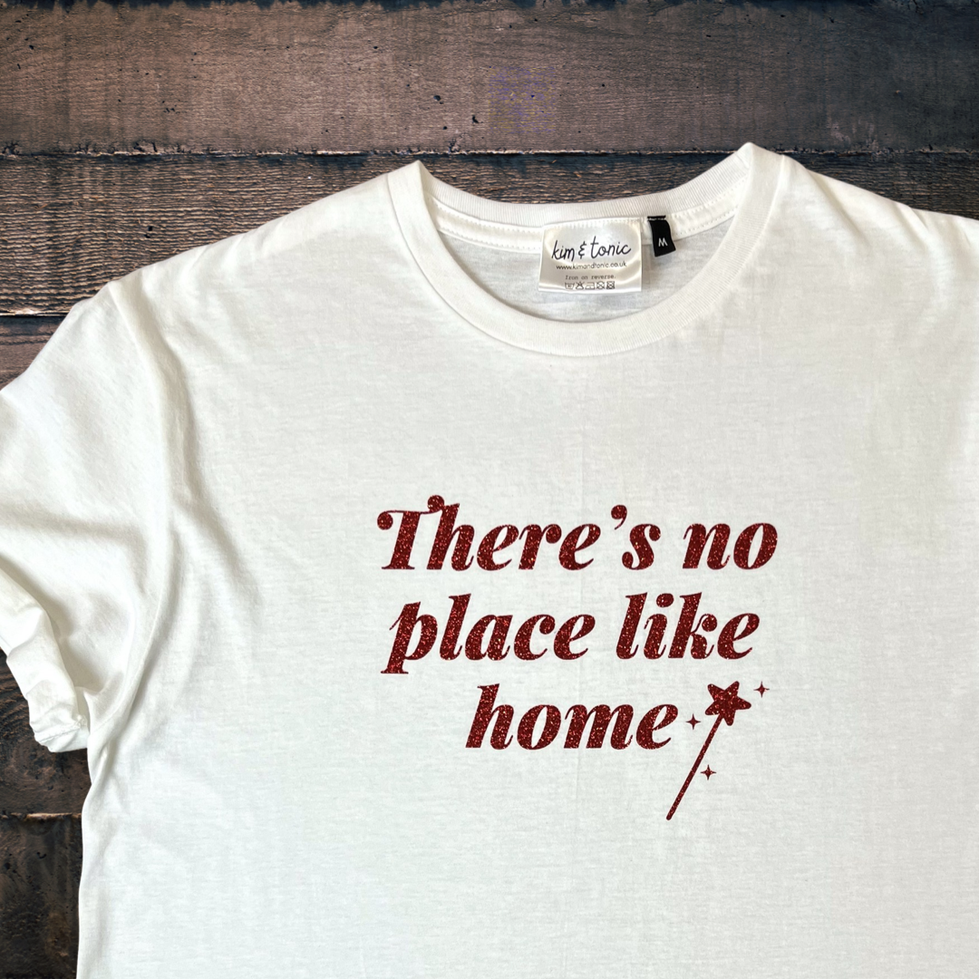 THERE’S NO PLACE LIKE HOME T-SHIRT. White with sparkly red print.