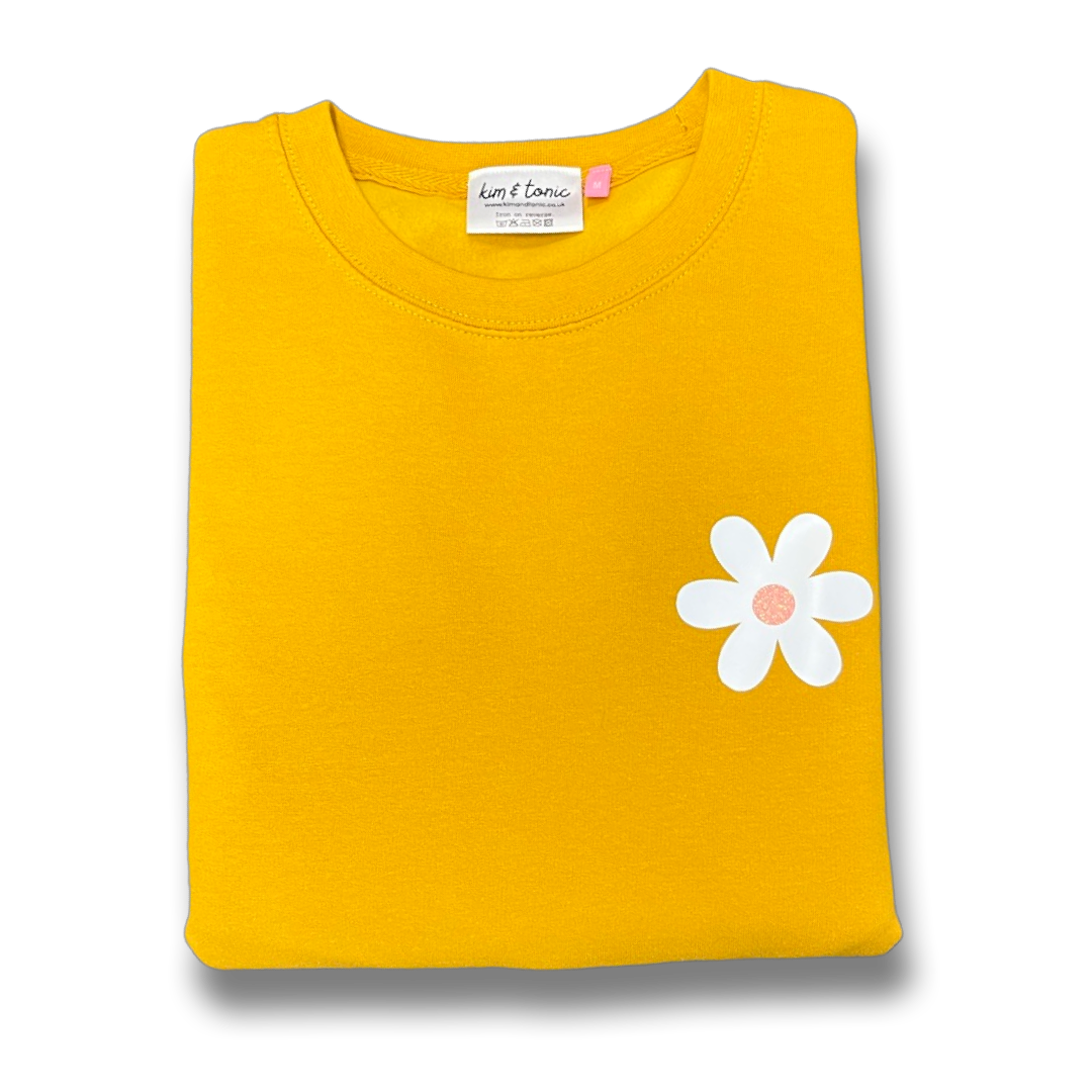 YELLOW DAISY SWEATSHIRT. With white and sparkly pink print.